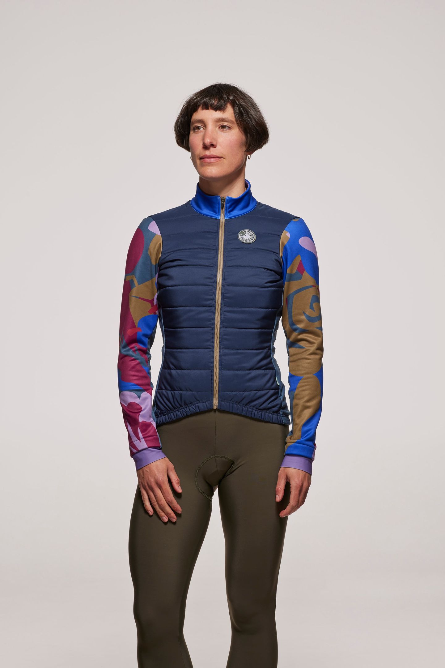 Model is wearing a size Small Jacket and Small Bib tight